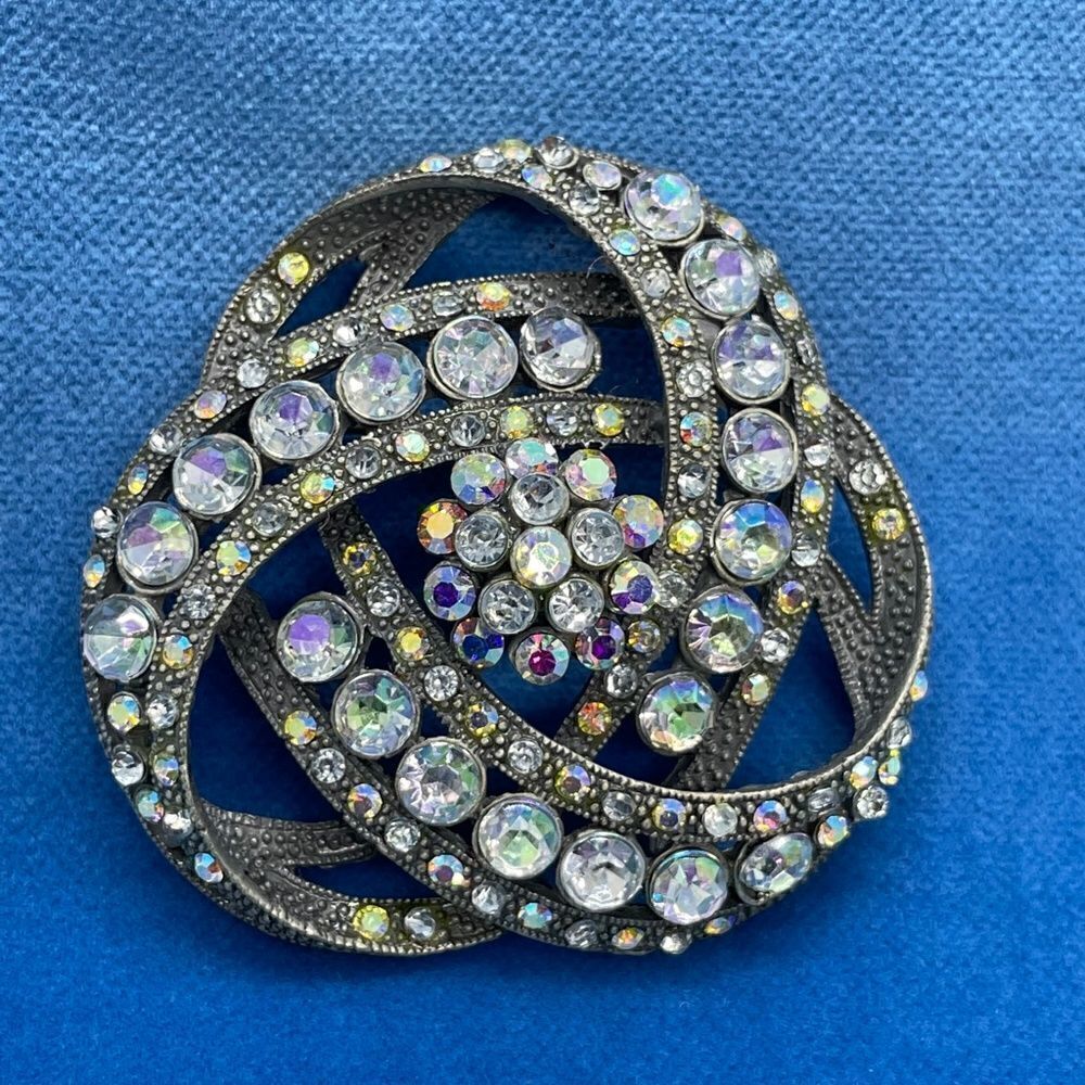 Vintage rhinestone knot brooch with fine metal detail pewter
